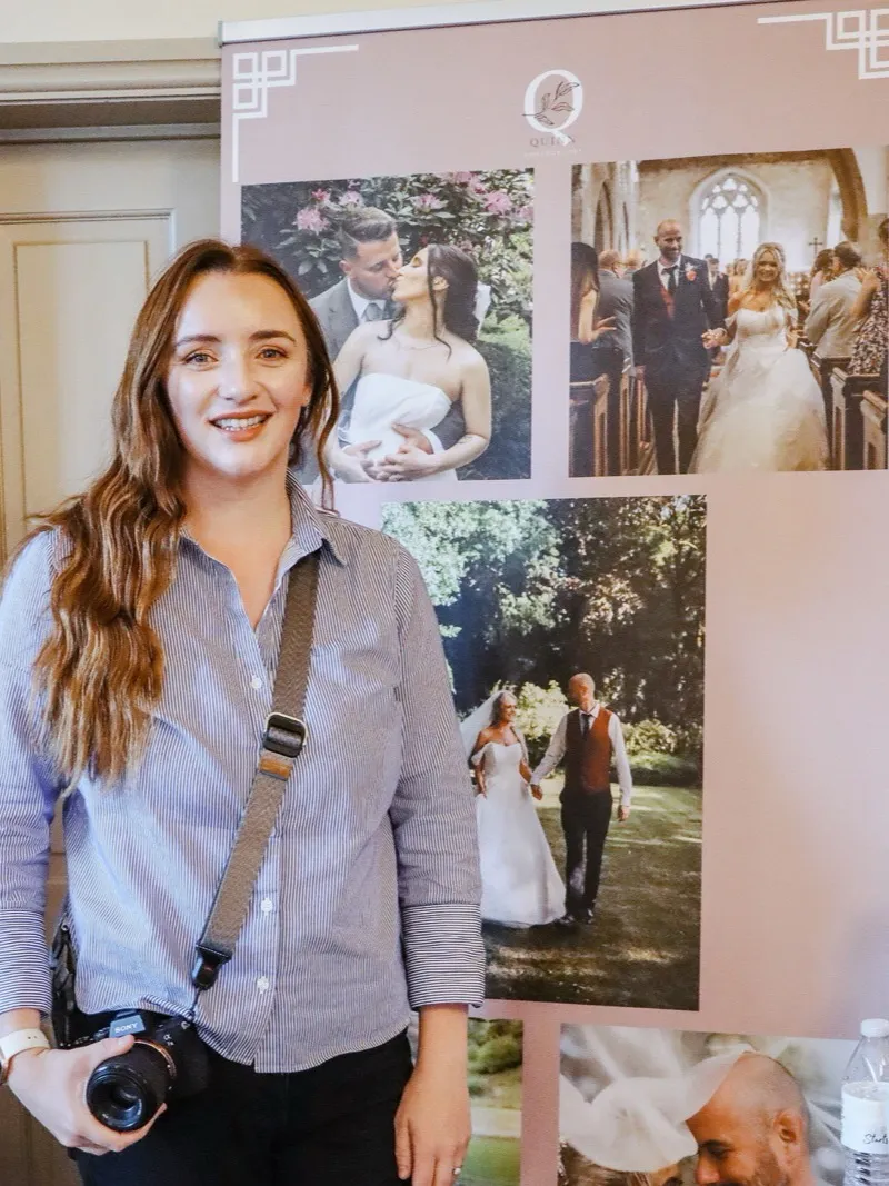 Gemma Quinn with her camera at a wedding fair