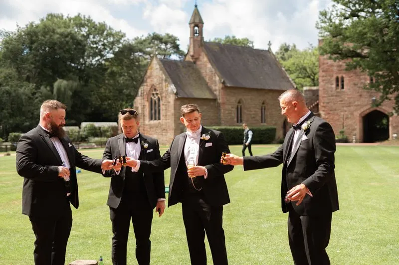 The groom and his groomsmen outside the venue