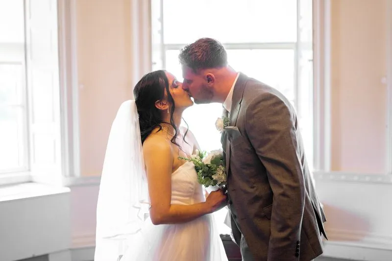The couple share a kiss