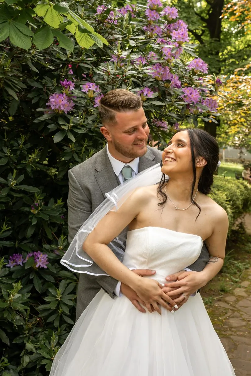 The couple beneath the blossom