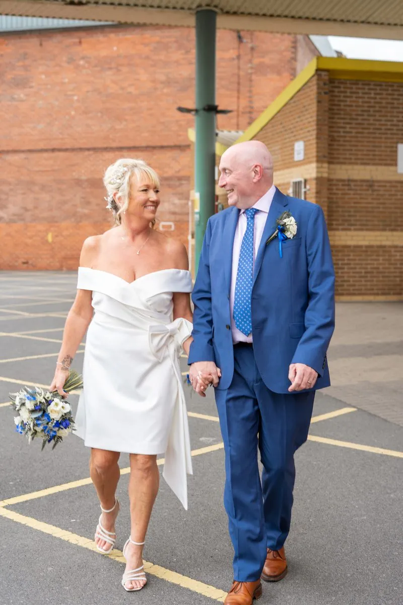 Bride and groom walking together