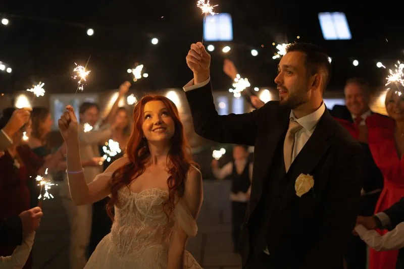 A sparkler send-off as the couple leave their evening reception