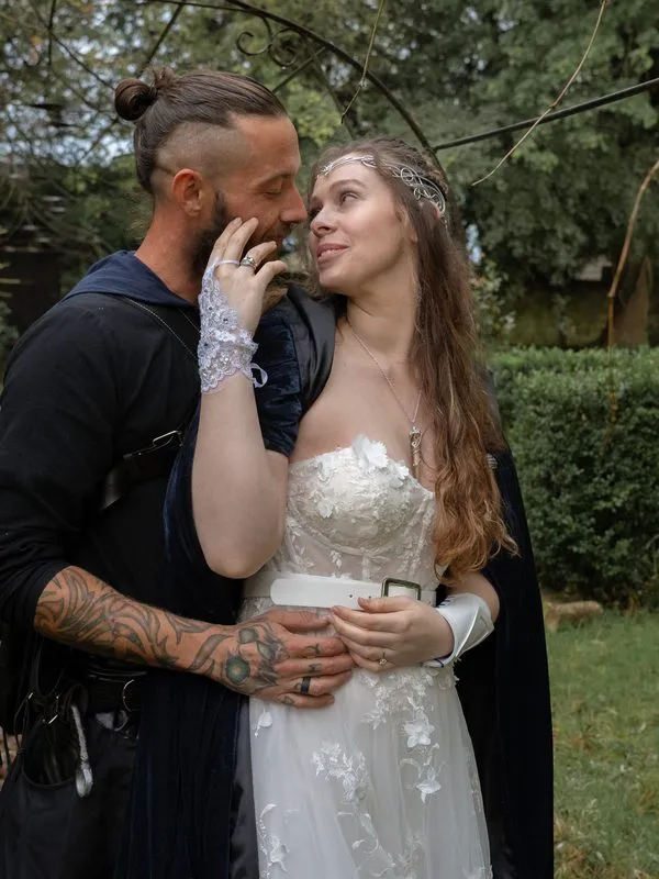 Bride and groom in a quiet garden moment