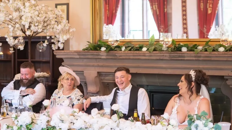 Relaxed candid moment between a couple on their wedding day